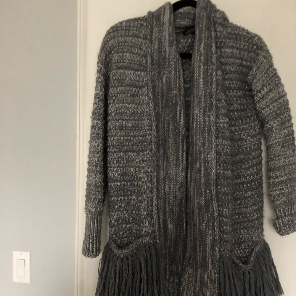 sweater with fringe pockets